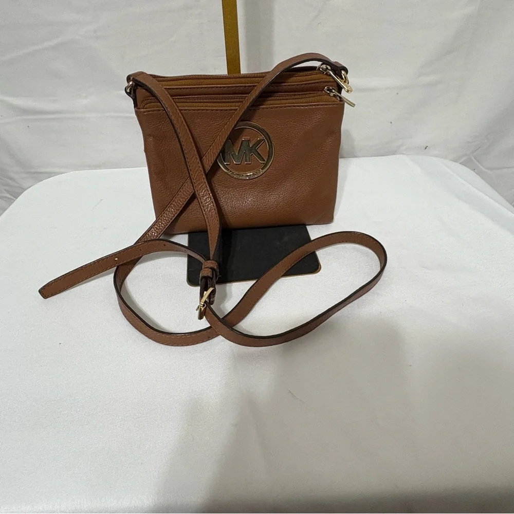 Michael Kors brown leather crossbody bag with gold-tone hardware